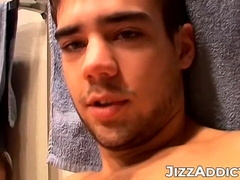 Horny Zack Randall strips off in the bathroom before rubbing his cock