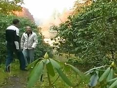 Two gay men masturbate and eat dick outdoors