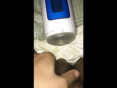 using an automatic stroking fleshlight type sexy toy to cum