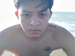Sexy Asian gay teen at beach sex party