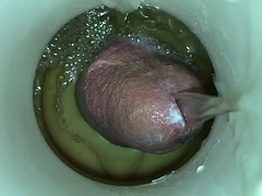 Golden fountain of sperm from a man with sperm in front of the camera