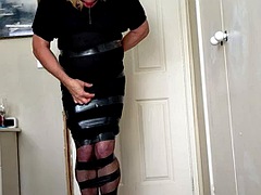 Daisy all taped up in a tight black dress