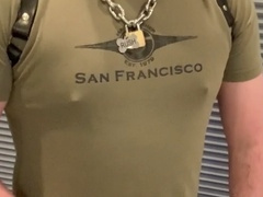 Muscular hunk strokes his massive uncut cock with his bulging balls