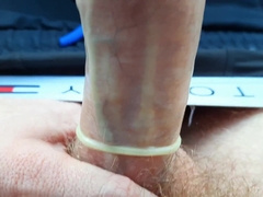 The boy packed the protection to the top with man milk while sitting in the camper