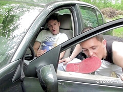 Two bad boys fucking in the car sneakers sniff