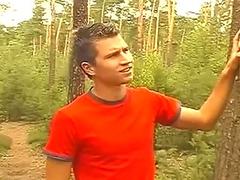 Cute gay teen stumbles into a threesome in the woods