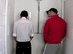 British lad pissing and notices the nerdy lad to him