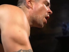 Clamped tied up bdsm stud sucking dick