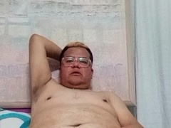 Chubby gay bears enjoying some playful nipple fun