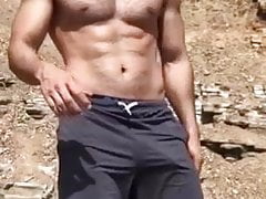 Sexy guy with huge bulge in shorts