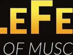 Buff and muscular Nozomu lubes his erect cock while doing an interview