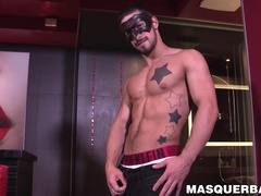 Handsome masked homo strips naked and starts to masturbate