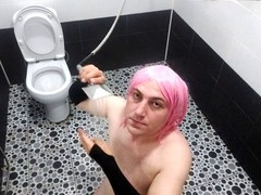 Curvy crossdresser Ketty teases on the bathroom floor