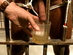 Dominant man having his way with the tall prisoner