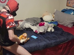 Cute twink plays with plushie while watching gay porn and indulging in self-pleasure