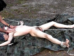 Camping bros have fun pulling each other's balls