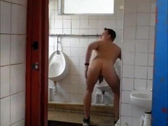 Gloryhole Masturbation: Amateur Hunk Fun in the Restroom
