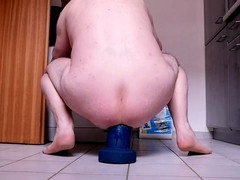 Dildo fun in the kitchen with Qualzucht