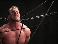 Muscular DILF provides great views in bondage fetish