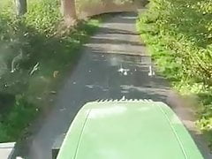 Farmer drives tractor