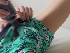 Asian Fellow Jerking on the Bed with a Rubdown Gun