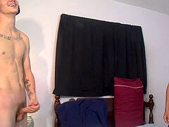 two straighties are jerking their hard-ons while talking