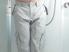 Guy pees light coloured pants