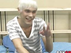 Young gay man playing with his dick during an interview