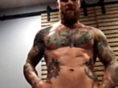 tatted bearded muscle father squirts a stream