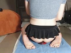 Crossdresser enthusiastically bounces on a plastic dong