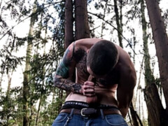 Big-dicked hunk Jake Hart jerking off in the woods