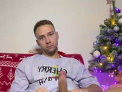 A young boy plays with his gigantic enormous fuck-stick and blows a load