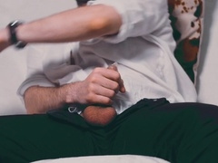 Attractive Noel Dero enjoys an intimate condom close-up while watching adult content