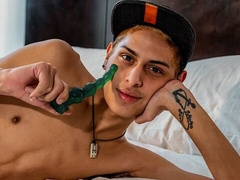 Skinny Tommy Ameal fucks his ass with a sexy dildo