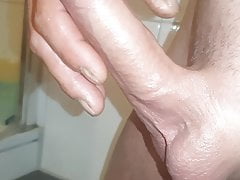 Young guy jerks his uncut cock to nice cumshot