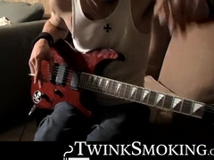 Straight rocker Axel plays his guitar and his throbbing cock with his pack of cigaret