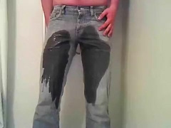 Boy pissing his pants and jerking off