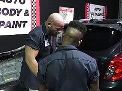 Muscular mechanic fucks his black employee in the shop