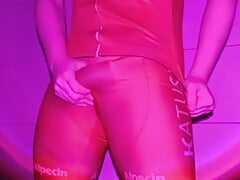 Cute twink strips off her tight cycling suit and shows off her big ass and her big cock