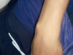 Young Indian Desi lad strokes his hairy cock and unleashes a hefty load