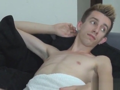 Kinky twink gives footjob