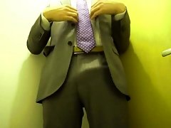 Standing jerk off in suit