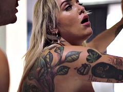 Busty tattooed and pierced babe with big ass rides boyfriends cock