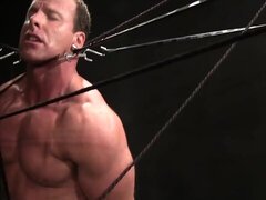Muscular DILF endures electro bondage in serious perversions