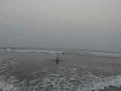 Nude Girl Swimming In The Ocean