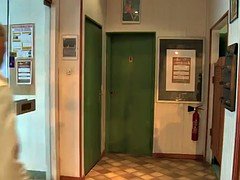 Two sexy busty female players and their coach in the locker room