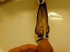 Piss in co-workers high heel (peep toe)