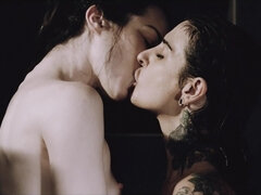 Brunette lesbian and tattooed stepmom have fun in the shower room