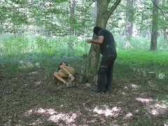 Puny breasted brown-haired got cuffed and left bare in the nature, in the late afternoon