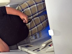 Cacho caresses in a bath of an airplane